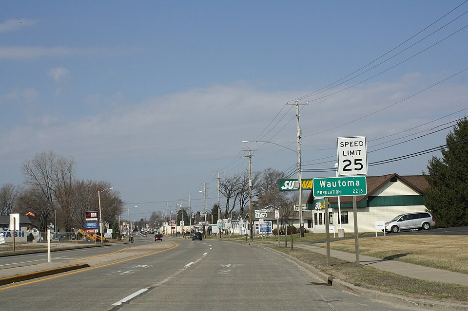 Looking west at the sign for Wautoma, Waushara County, Wisconsin